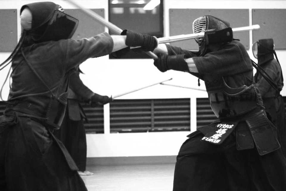 Kendo players striking each other at same time